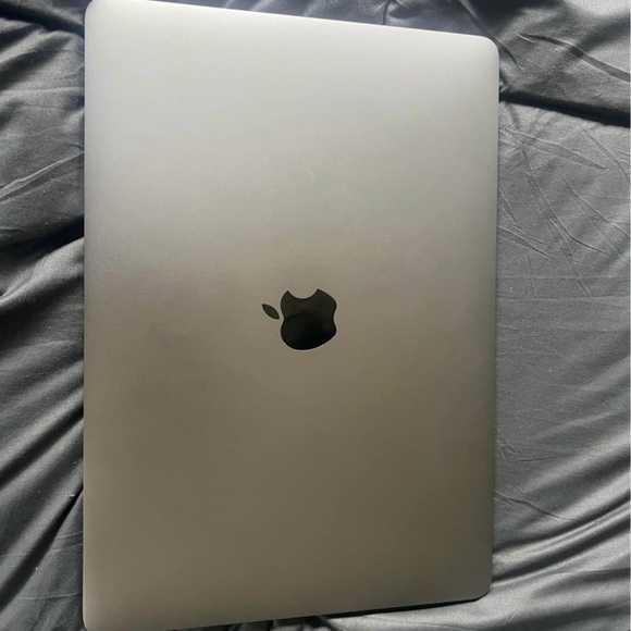 Apple laptop color grey any questions feel free to ask thank you.
